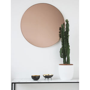 Orbis™ Rose gold / Peach Tinted Modern Round Mirror with a Copper Frame