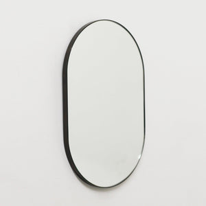 Capsula™ Capsule Shaped Bespoke Mirror with Patina Frame