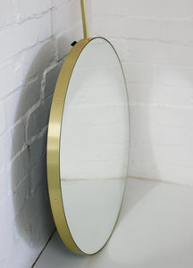 Orbis™ Ceiling Suspended Modern Round Mirror with a Brushed Brass Frame