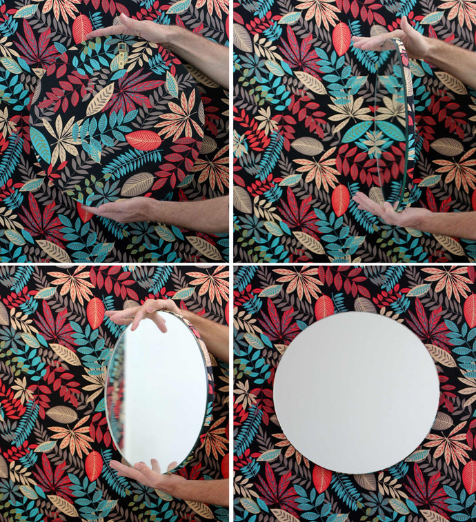 Silver Orbis round mirror™ with a hand printed fabric backing