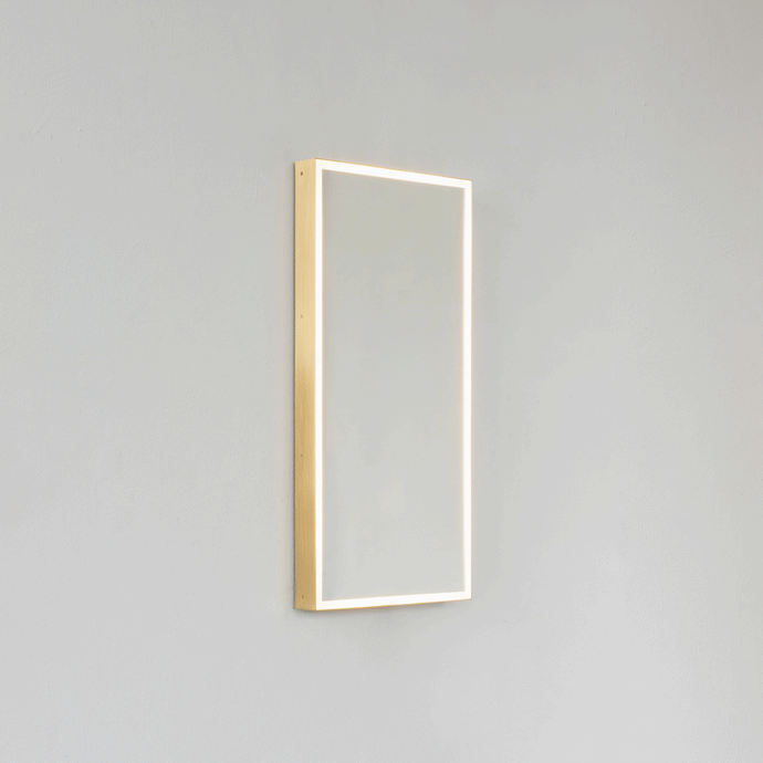 Front illuminated Quadris™ rectangular mirror with square corners and a solid brushed brass frame