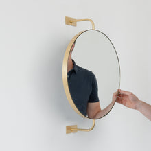 NEW Vorso™ Wall Attached Suspended Rotating Round Mirror with a Brushed Brass Frame