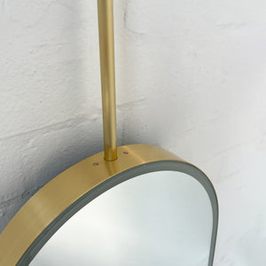 Capsula™ Ceiling Suspended Contemporary Mirror with a Brass Frame and Front Illumination