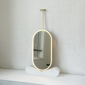 Capsula™ Ceiling Suspended Contemporary Mirror with a Brass Frame and Front Illumination