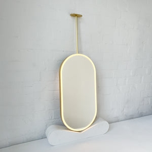 Capsula™ Ceiling Suspended Contemporary Mirror with a Brass Frame and Front Illumination