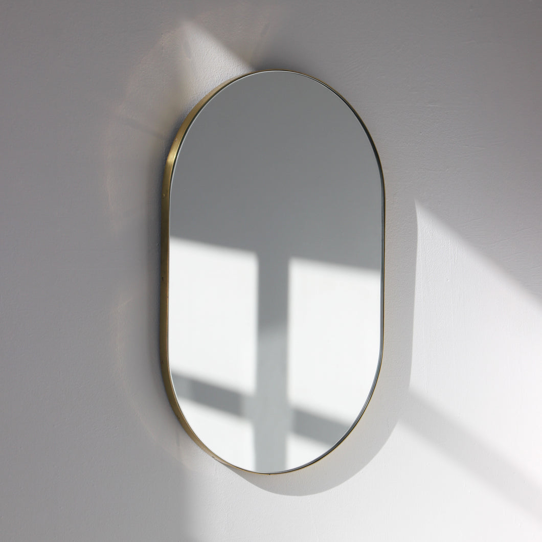 Capsula™ Capsule shaped Wide Mirror with Elegant Brass Frame