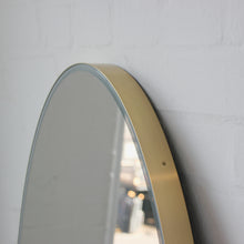 NEW Ovalis™ Oval shaped Front Illuminated Modern Large Mirror with a Brushed Brass Frame