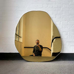 Contemporary Gold Tinted Freeform Mirror with Brass Frame