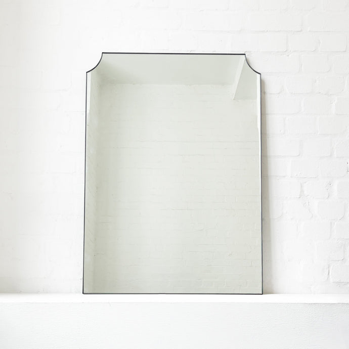 Mid century inspired mirror with a minimalist bronze patina brass frame