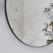 Orbis™ Antiqued Round Mirror with a Handcrafted Bronze Patina Frame