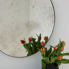 Orbis™ Antiqued Round Mirror with a Handcrafted Bronze Patina Frame