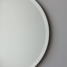 Elegant Orbis™ Round Bevelled Frameless Mirror with Velvet Backing