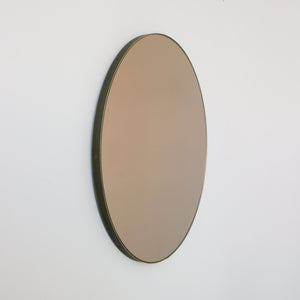 Orbis™ Bronze Tinted Round Contemporary Mirror with a Bronze Patina Brass Frame