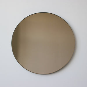 Orbis™ Bronze Tinted Round Contemporary Mirror with a Bronze Patina Brass Frame