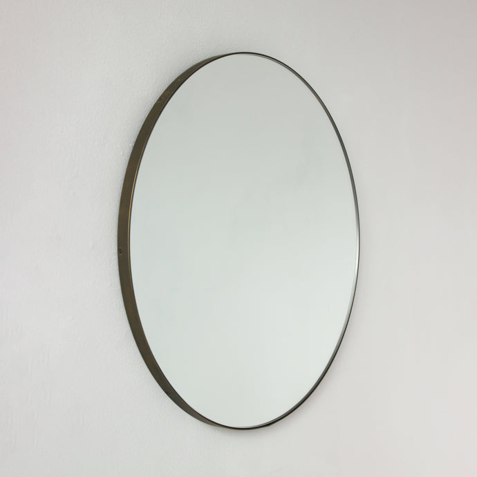 Orbis™ Round Mirror with a Minimalist Handcrafted Bronze Patina Frame