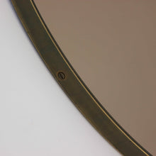 Orbis™ Bronze Tinted Round Contemporary Mirror with a Bronze Patina Brass Frame