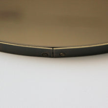 Orbis™ Bronze Tinted Round Contemporary Mirror with a Bronze Patina Brass Frame