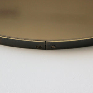 Orbis™ Bronze Tinted Round Contemporary Mirror with a Bronze Patina Brass Frame