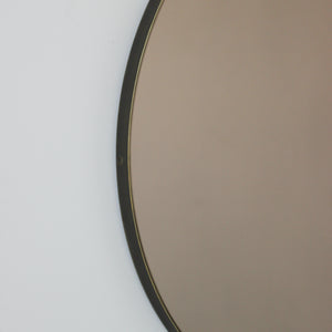 Orbis™ Bronze Tinted Round Contemporary Mirror with a Bronze Patina Brass Frame
