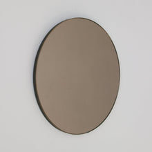 Orbis™ Bronze Tinted Round Contemporary Mirror with a Bronze Patina Brass Frame