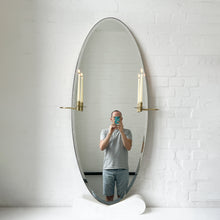 Oval shaped Bevelled Mirror with a Brushed Brass Frame