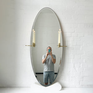Oval shaped Bevelled Mirror with a Brushed Brass Frame