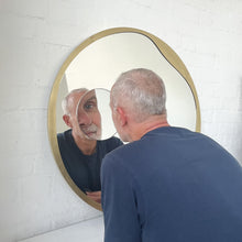 Round Mirror with Integrated Magnifying Mirror and Decorative Brass Full Frame