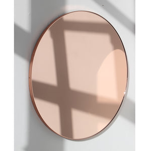 Orbis™ Rose gold / Peach Tinted Modern Round Mirror with a Copper Frame