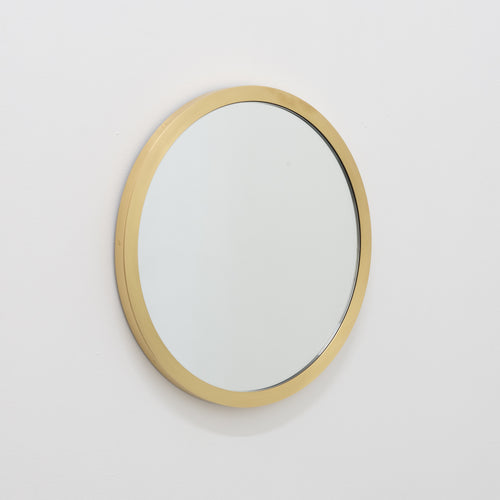 Orbis™ Round Mirror with a Full Brass Frame