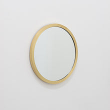 New Orbis™ Round Mirror with a Full Brass Frame