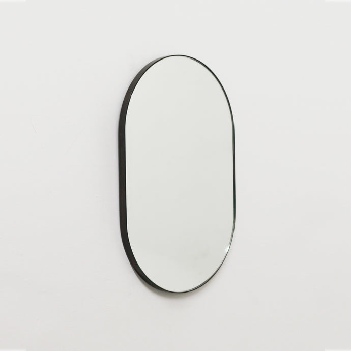Capsula™ Capsule Shaped Bespoke Mirror with Patina Frame