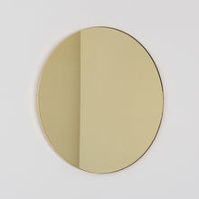 Orbis™ Round Gold Tinted Contemporary Mirror with a Brass Frame