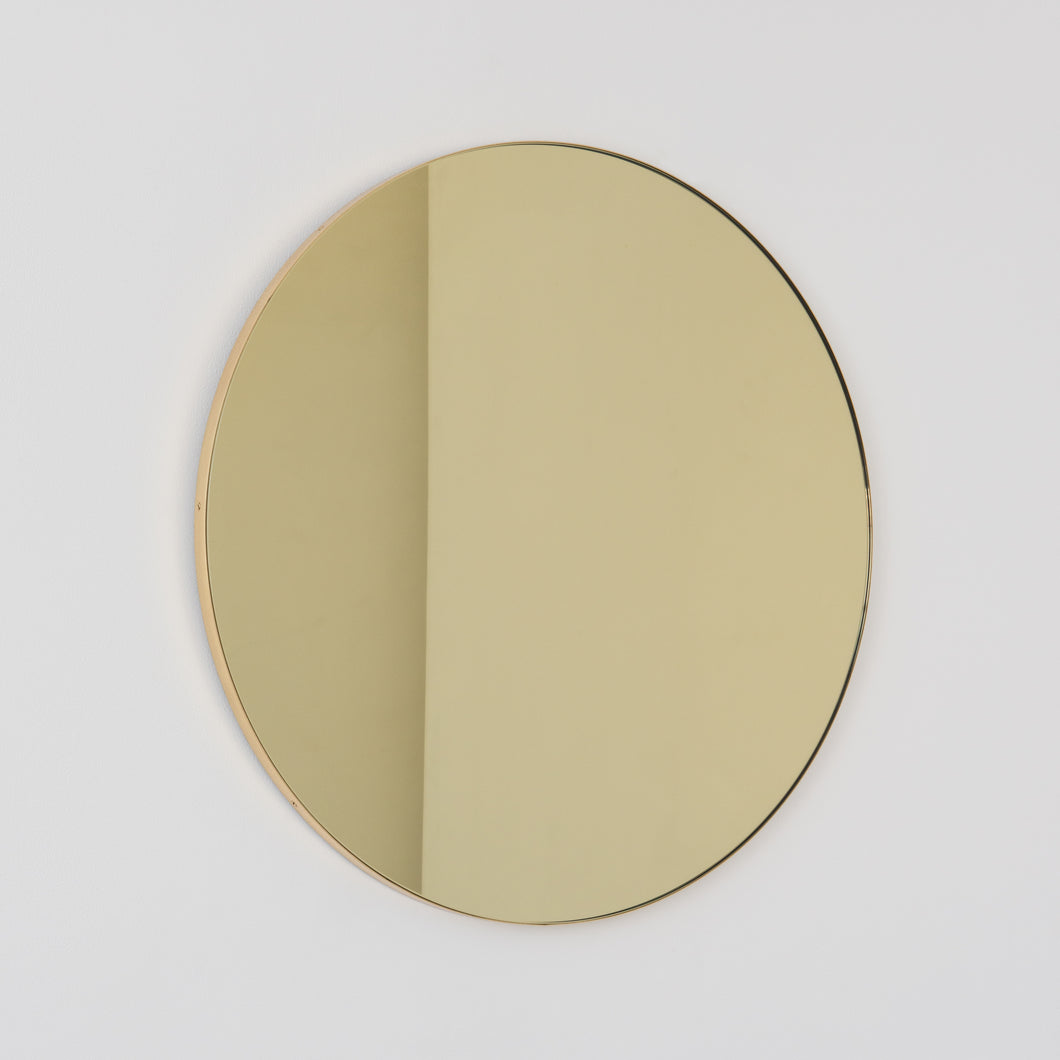 Orbis™ Round Gold Tinted Contemporary Mirror with a Brass Frame