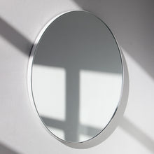 Orbis™ Round Minimalist Mirror with a Modern White Frame