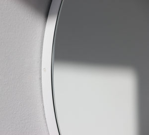 Orbis™ Round Minimalist Mirror with a Modern White Frame