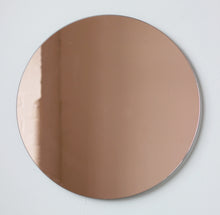 Orbis™ Rose gold / Peach Tinted Minimalist Contemporary Round Frameless Mirror