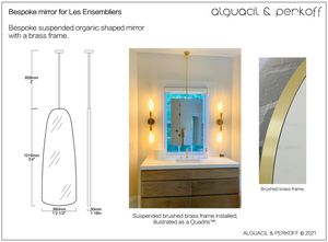 Bespoke suspended organic shaped mirror with brushed brass frame